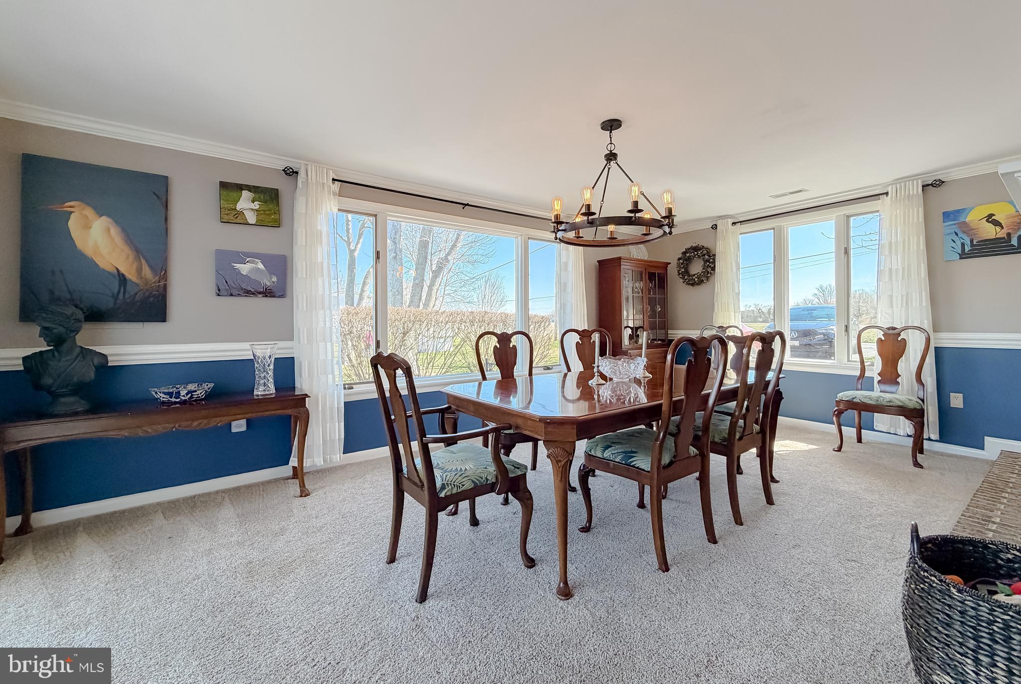 49716 Airedele Road Ridge, MD 20680 - Photo 29 of 101 a view of a dining room with furniture window and wooden floor