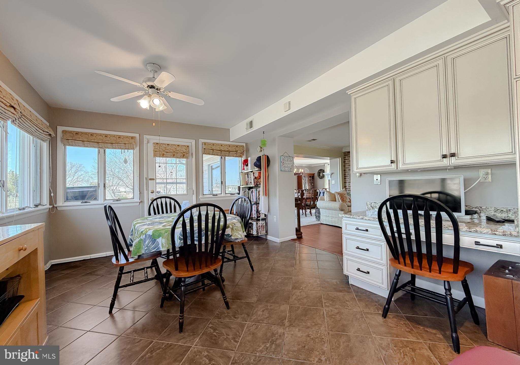 49716 Airedele Road Ridge, MD 20680 - Photo 34 of 101 a view of a dining room with furniture window and outside view