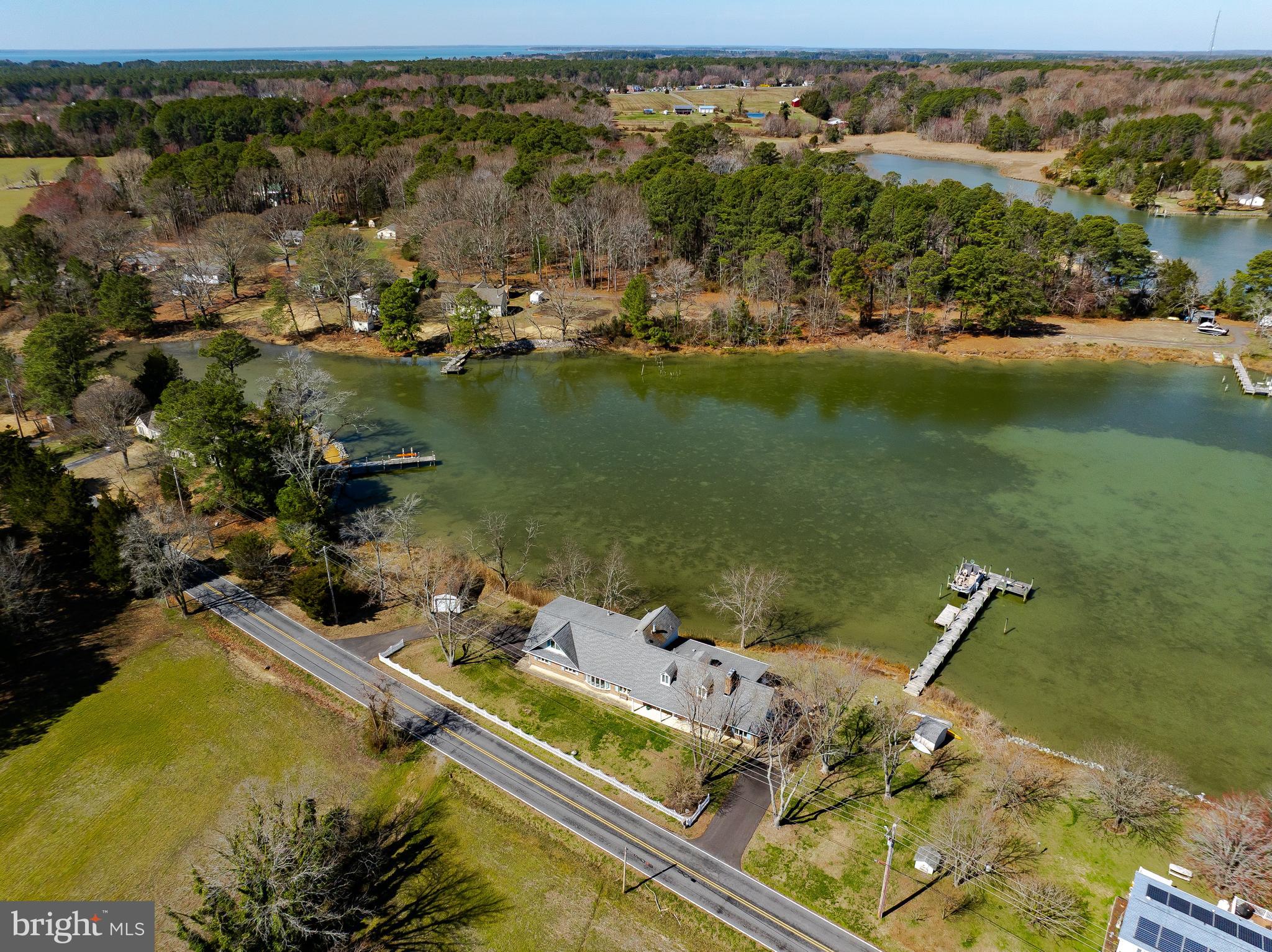49716 Airedele Road Ridge, MD 20680 - Photo 40 of 101 an aerial view of a house with a lake view