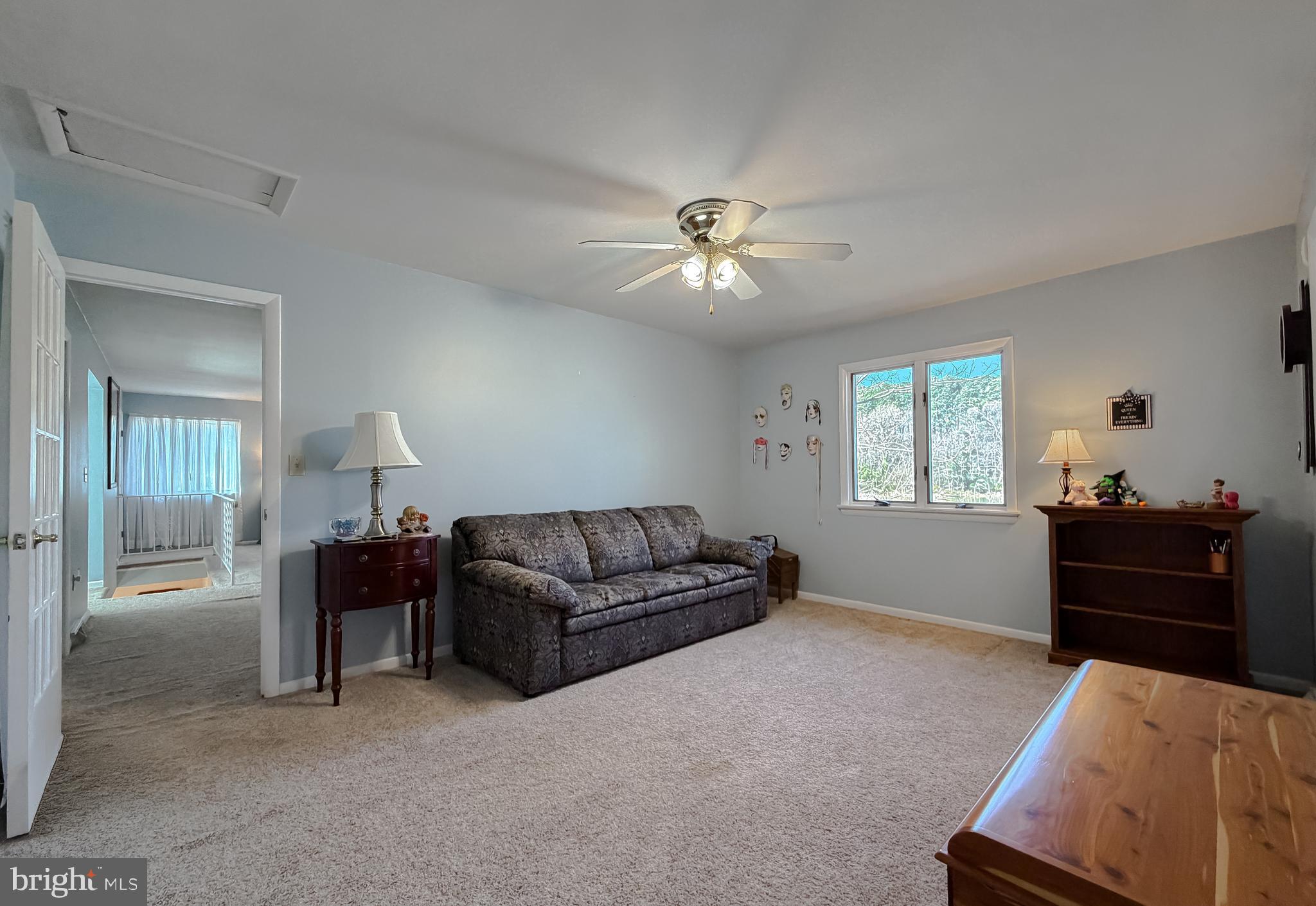 49716 Airedele Road Ridge, MD 20680 - Photo 67 of 101 a living room with furniture and a window