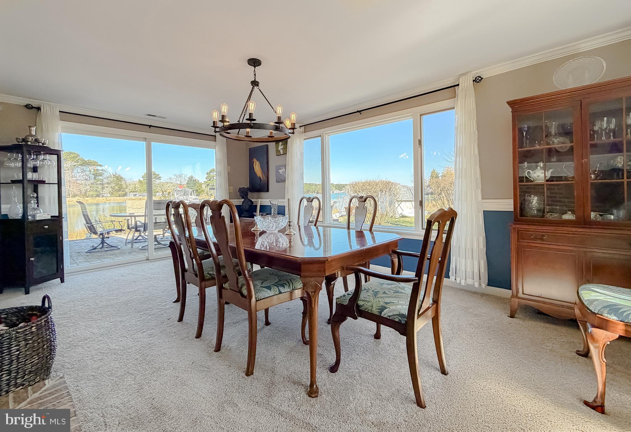 49716 Airedele Road Ridge, MD 20680 - Photo 9 of 101 a dining room with furniture window and wooden floor