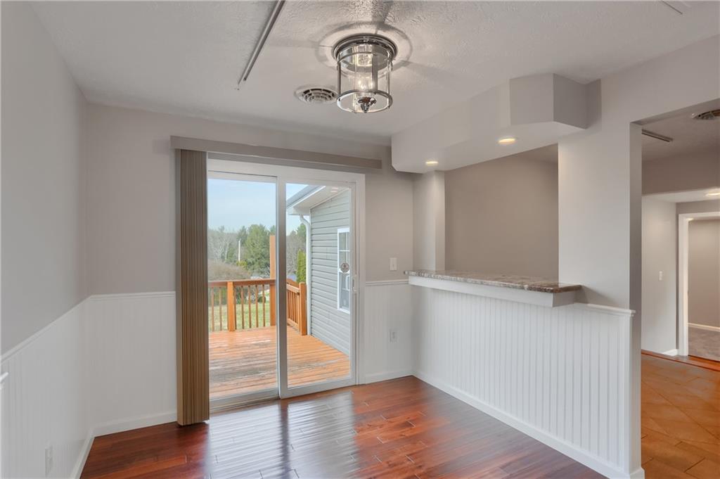 110 Oakville Road Beaver Falls, PA 15010 - Photo 13 of 48 Enjoy access to the rear deck from the dining room.