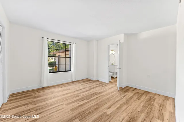 a bathroom with a sink a mirror and a bathtub
