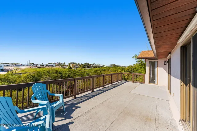 a bathroom with a double vanity sink mirror and toilet