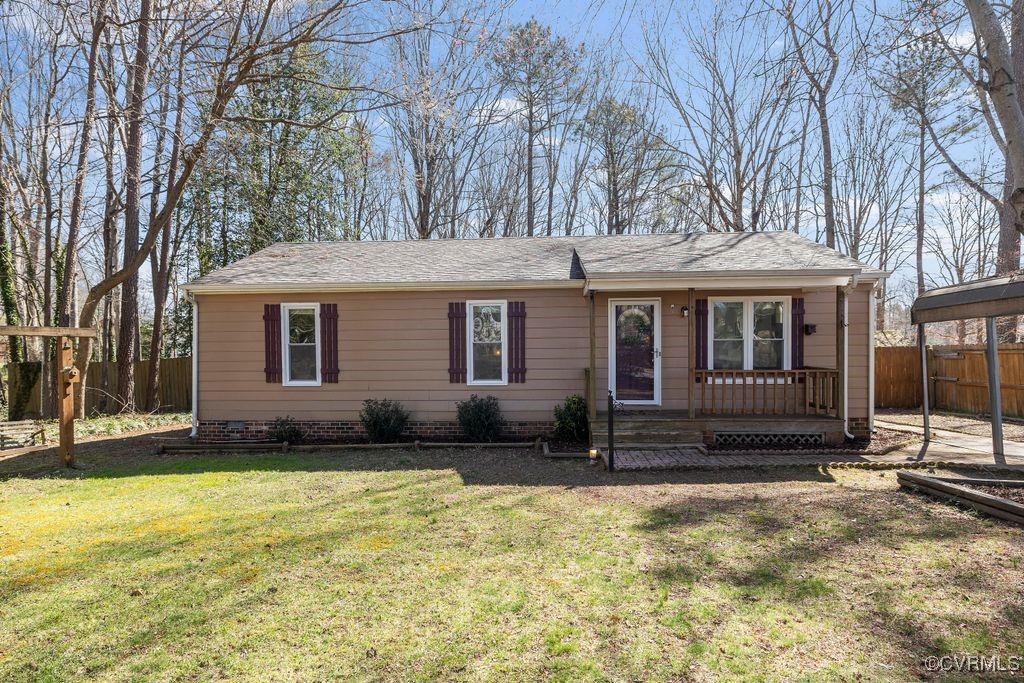 11041 Moravia Road Midlothian, VA 23112 - Photo 1 of 38 a front view of a house with a yard