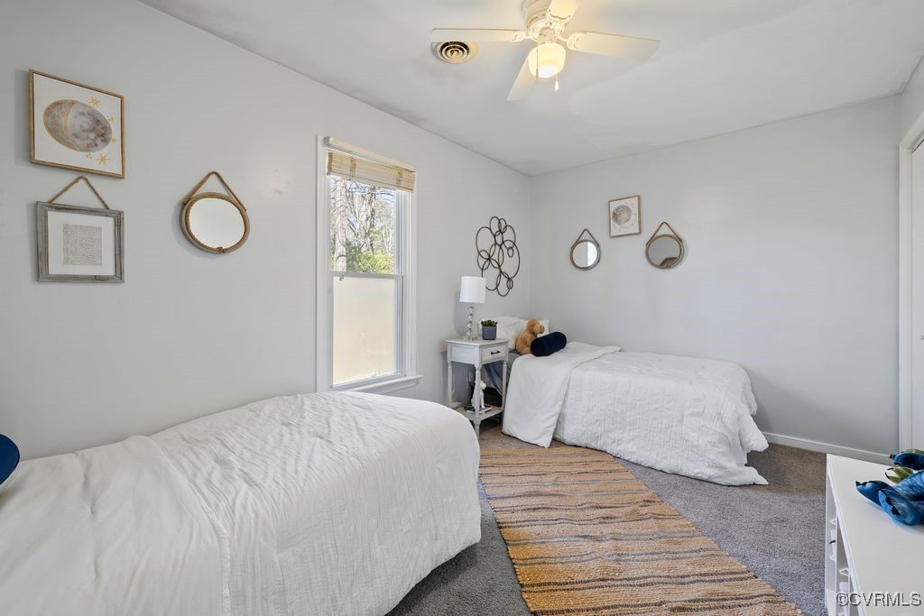 11041 Moravia Road Midlothian, VA 23112 - Photo 15 of 38 a bedroom with double bed and a window