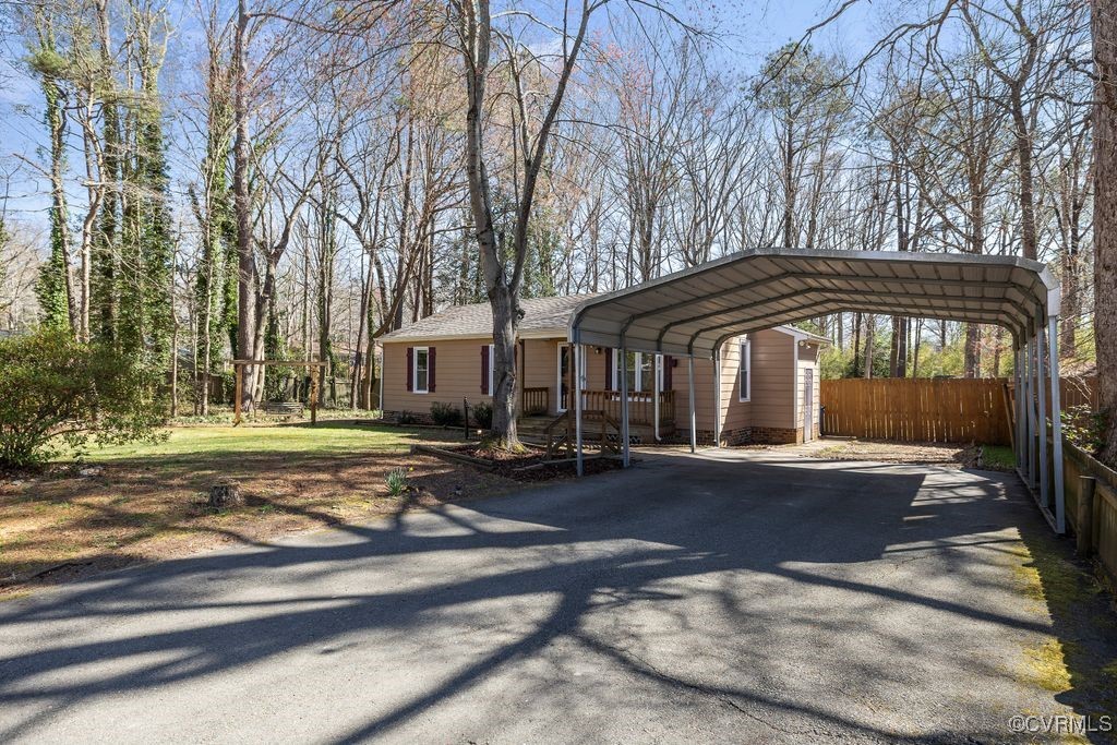 11041 Moravia Road Midlothian, VA 23112 - Photo 17 of 38 a front view of a house with a yard