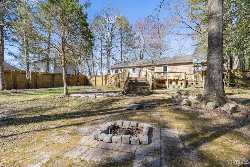 11041 Moravia Road Midlothian, VA 23112 - Photo 29 of 38 a view of a yard with large trees