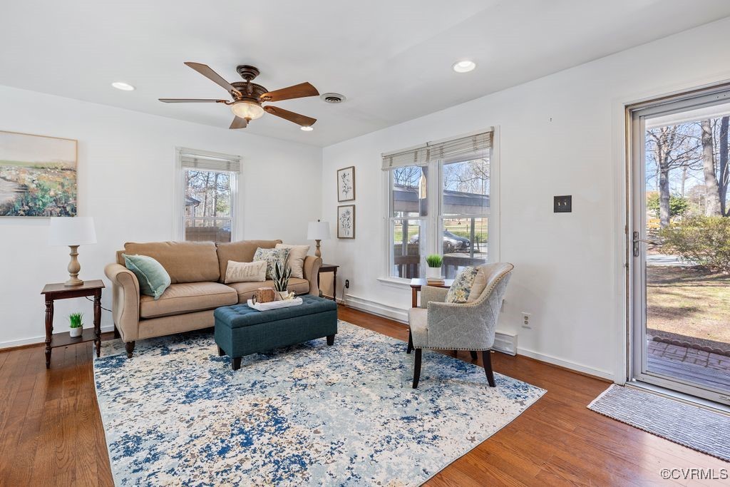 11041 Moravia Road Midlothian, VA 23112 - Photo 4 of 38 a living room with furniture and a rug