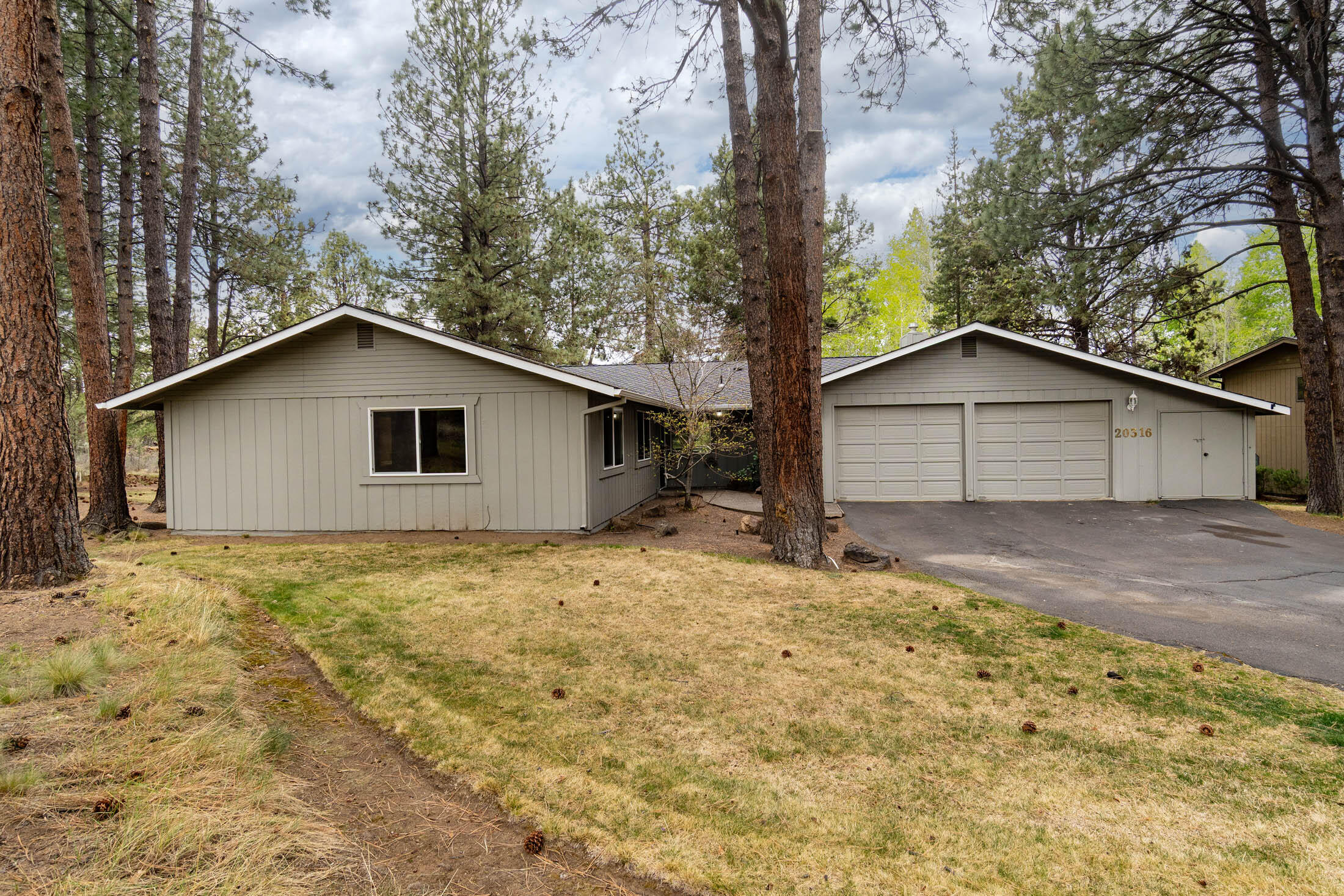 20316 Donkey Sled Road Bend, OR 97702 - Photo 2 of 50 a house with trees in the background