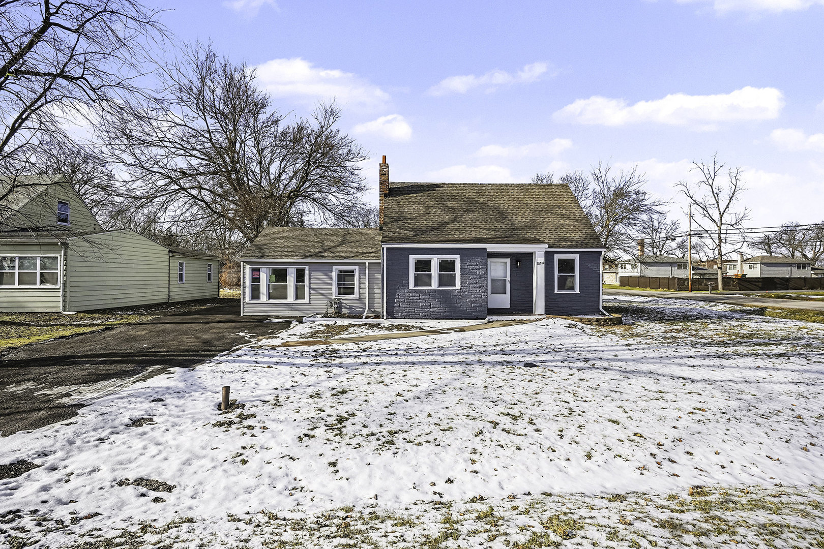 15700 Turner Avenue Markham, IL 60428 - Photo 1 of 15 a front view of a house with a yard