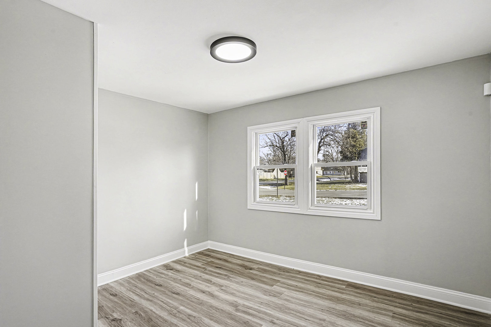 15700 Turner Avenue Markham, IL 60428 - Photo 12 of 15 a view of a room with wooden floor and window