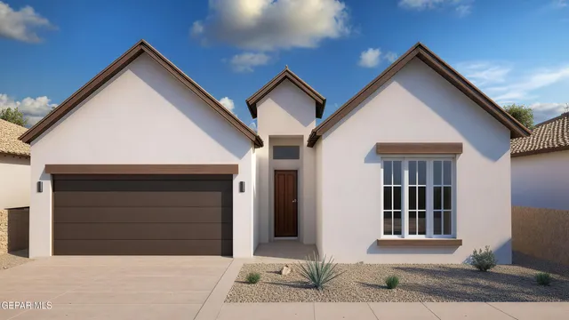 a front view of a house with garage