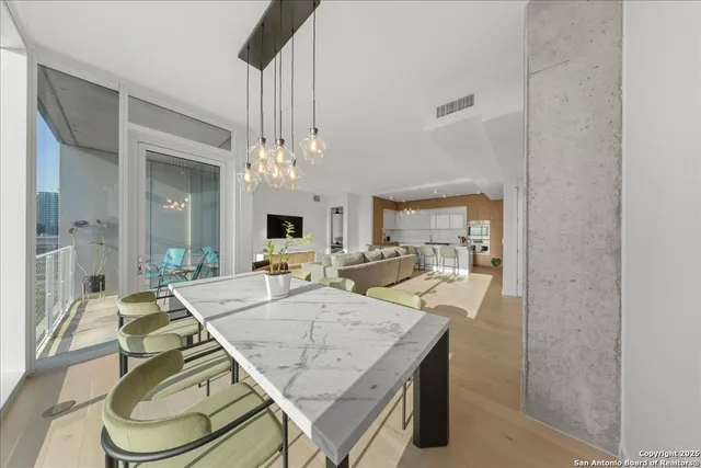 a view of a dining room with furniture