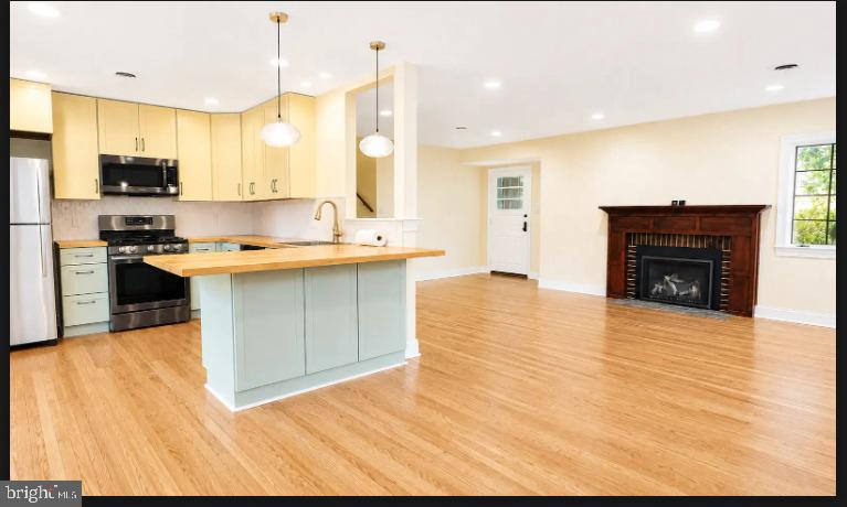 2 Snuff Mill Road Wilmington, DE 19807 - Photo 10 of 36 Modern kitchen with inviting warmth.