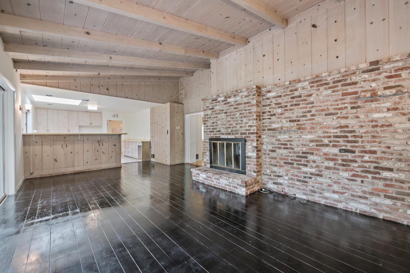 96 Edge Road Atherton, CA 94027 - Photo 11 of 28 a living room with stainless steel appliances wooden floor and a fireplace
