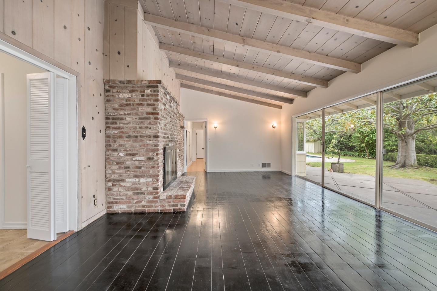 96 Edge Road Atherton, CA 94027 - Photo 13 of 28 a view of empty room with wooden floor and fan