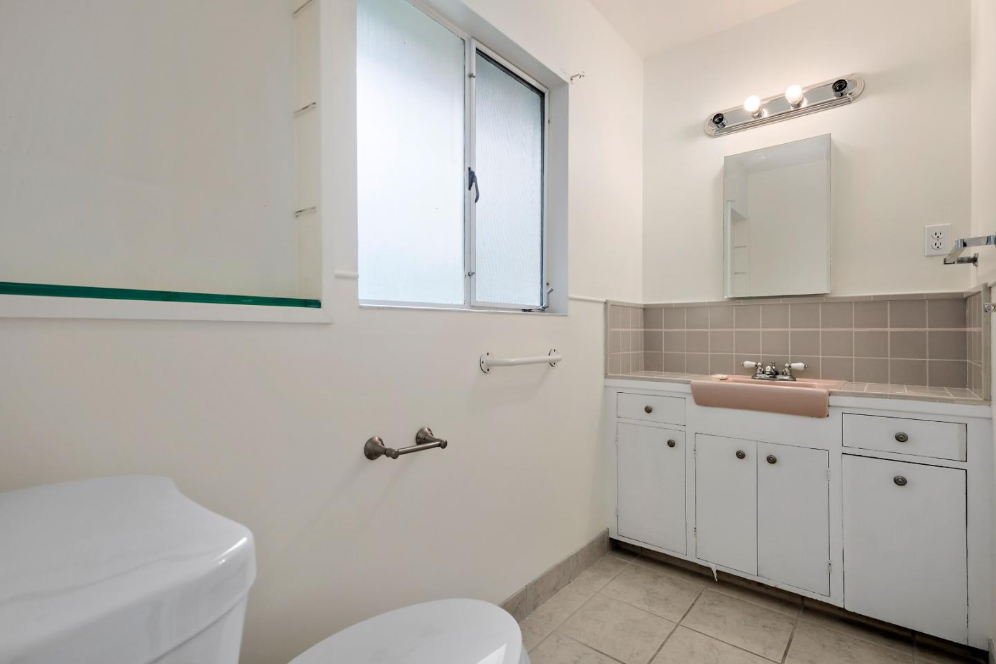 96 Edge Road Atherton, CA 94027 - Photo 14 of 28 a bathroom with a sink a toilet and vanity