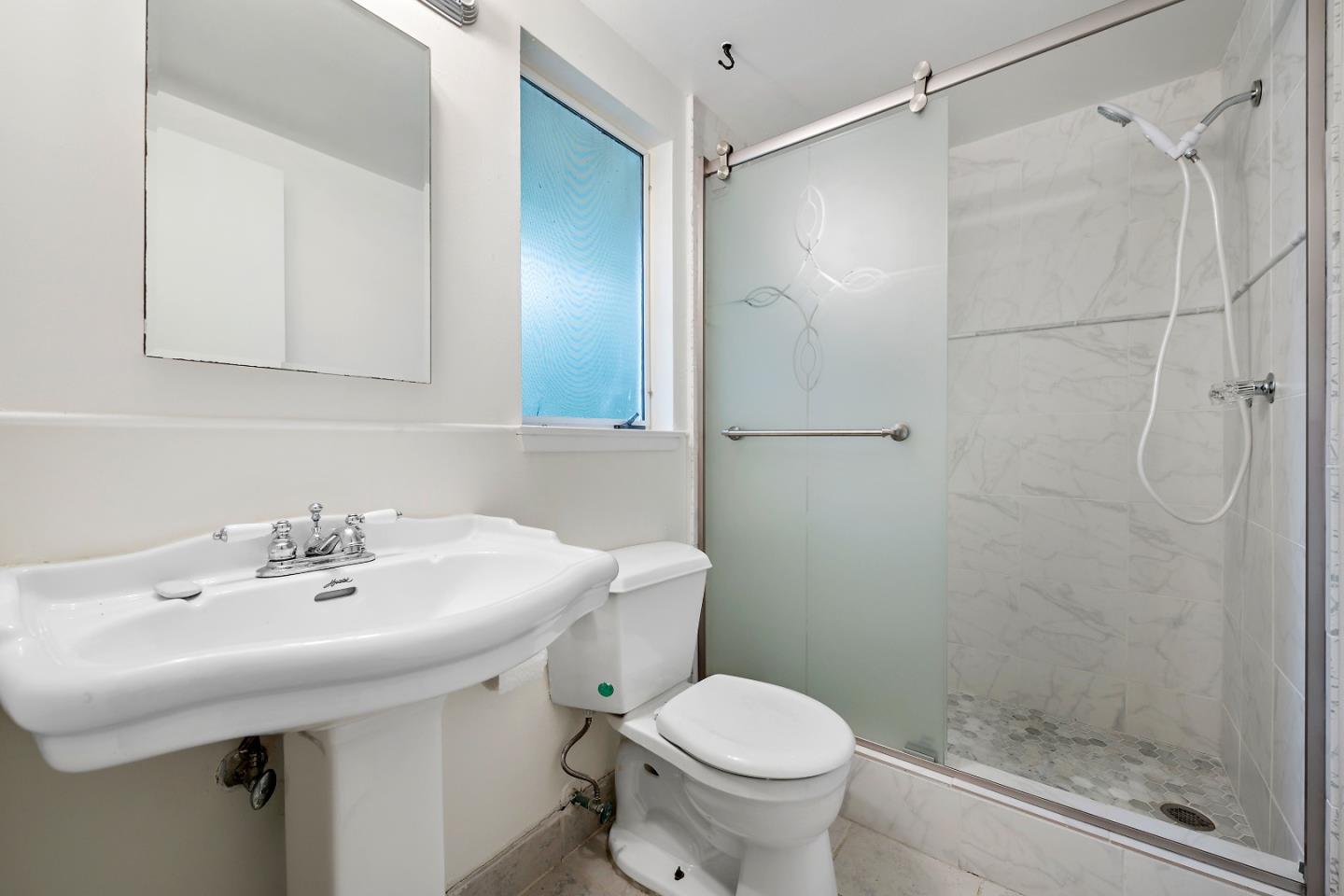 96 Edge Road Atherton, CA 94027 - Photo 19 of 28 a bathroom with a sink toilet and shower