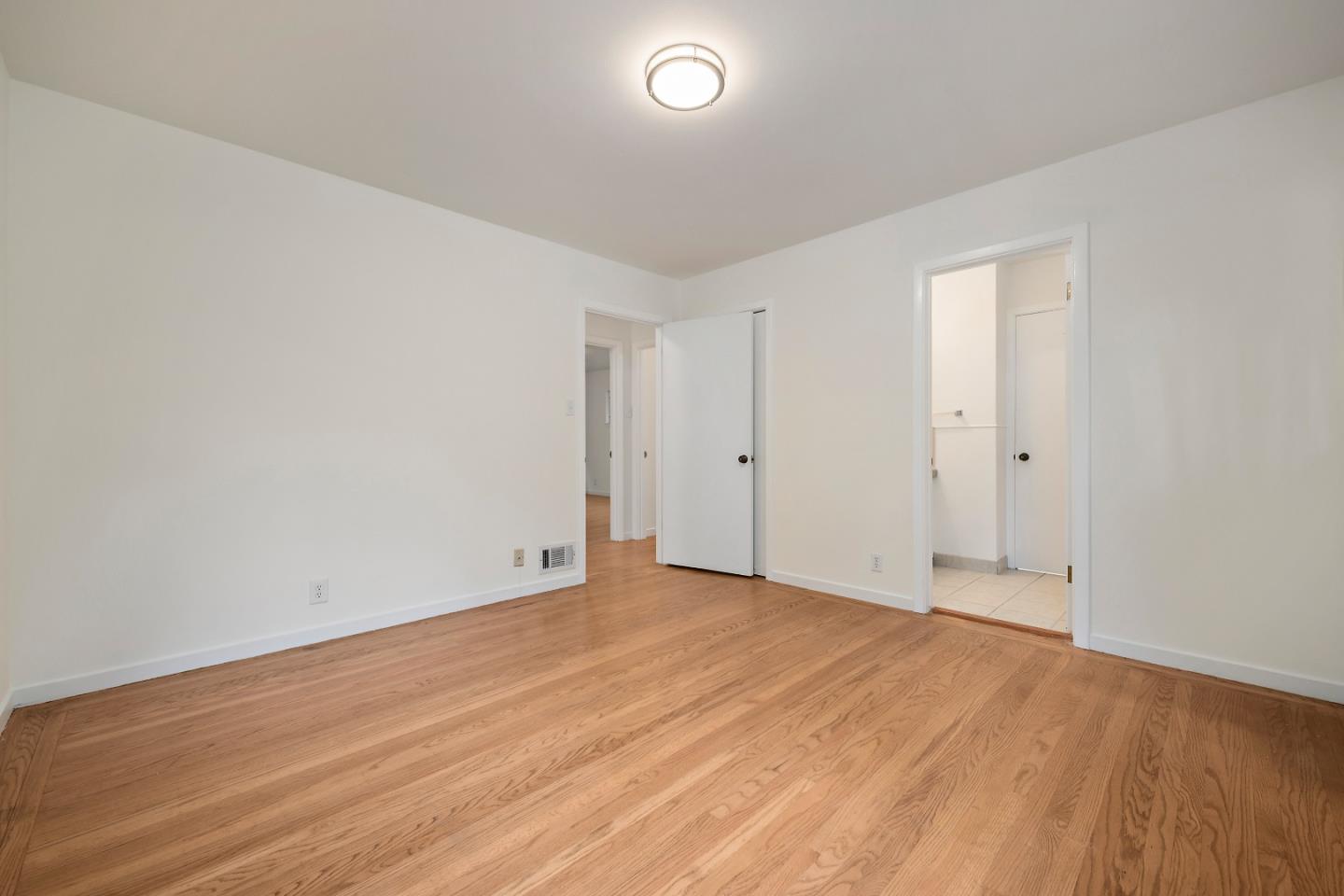 96 Edge Road Atherton, CA 94027 - Photo 21 of 28 a view of an empty room with wooden floor