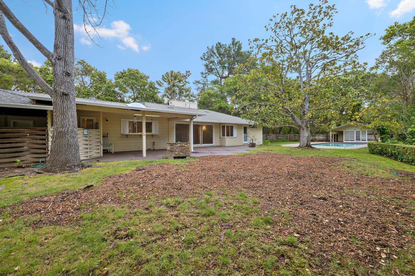 96 Edge Road Atherton, CA 94027 - Photo 23 of 28 a view of a house with yard and a garden