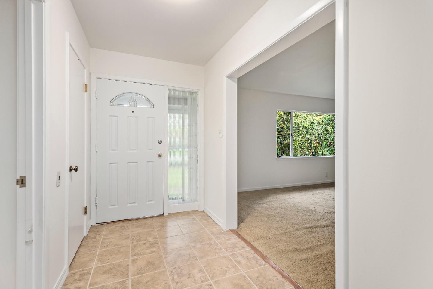 96 Edge Road Atherton, CA 94027 - Photo 4 of 28 an empty room with windows and closet