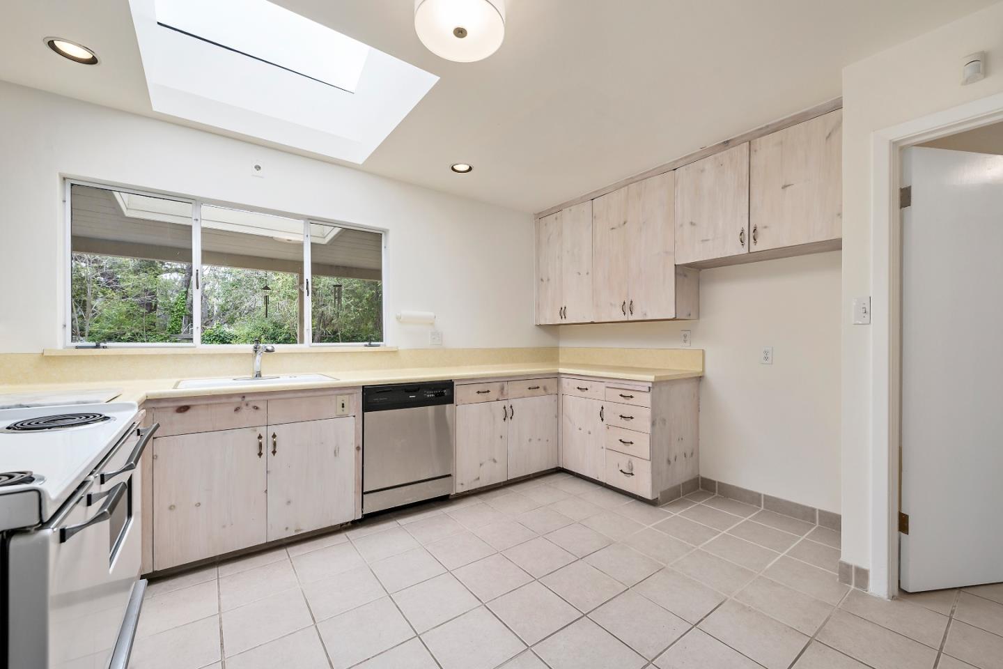 96 Edge Road Atherton, CA 94027 - Photo 7 of 28 a large white kitchen with white cabinets and a sink