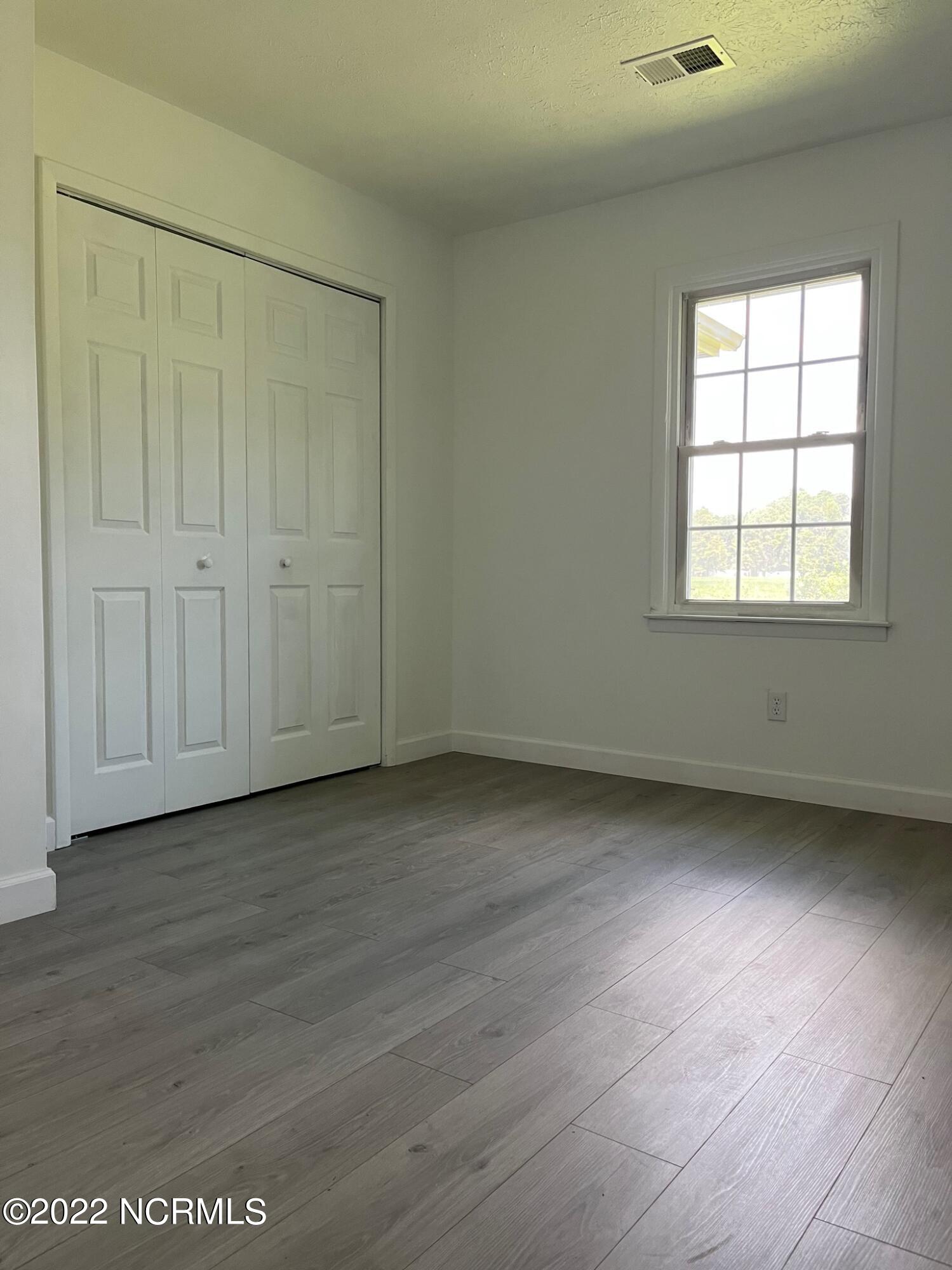 2240 Bird Cage Road Chadbourn, NC 28431 - Photo 5 of 16 2nd Bedroom has 11'x11' of space and a double door closet