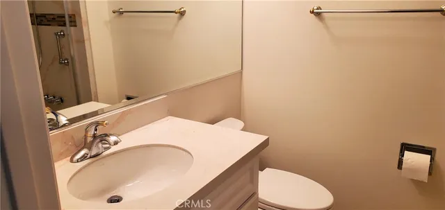 a bathroom with a sink and mirror