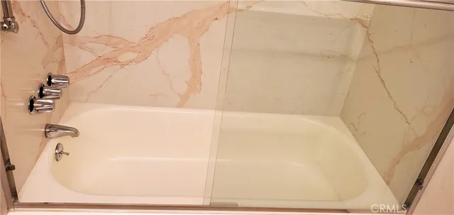 a bathroom with a bathtub