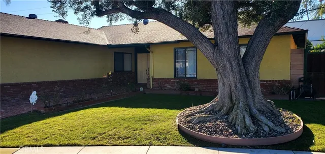 a view of a backyard with a tub