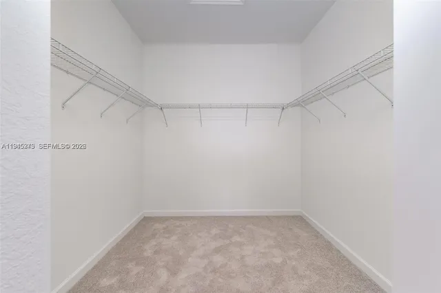 a view of a room with racks on the wall