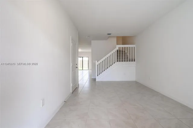 a view of an entryway with stairs