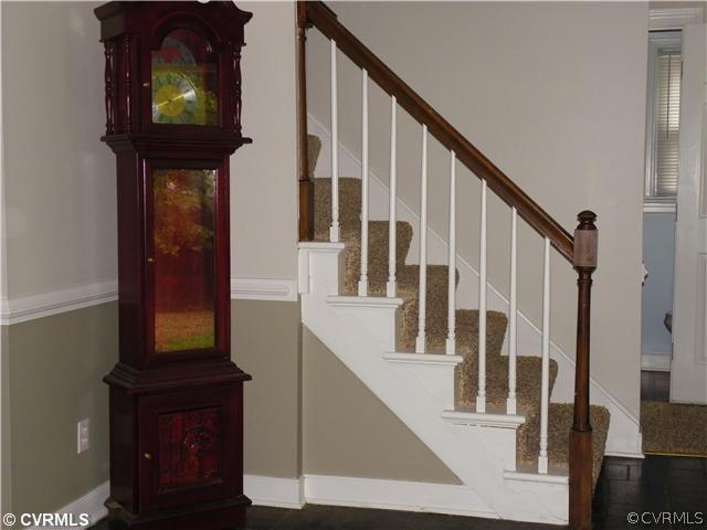 2511 Hicks Road North Chesterfield, VA 23235 - Photo 5 of 11 a view of staircase with wooden floor and a potted plant