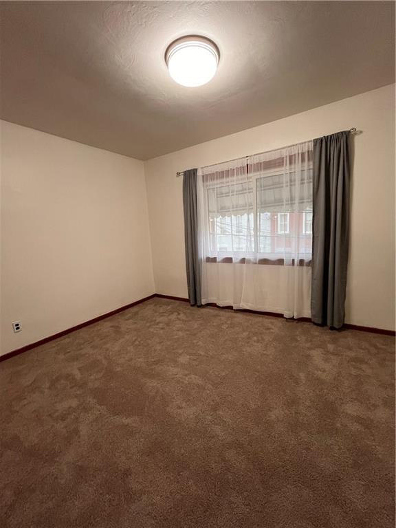 5124 Carnegie Street Pittsburgh, PA 15201 - Photo 19 of 44 an empty room with a empty space and windows