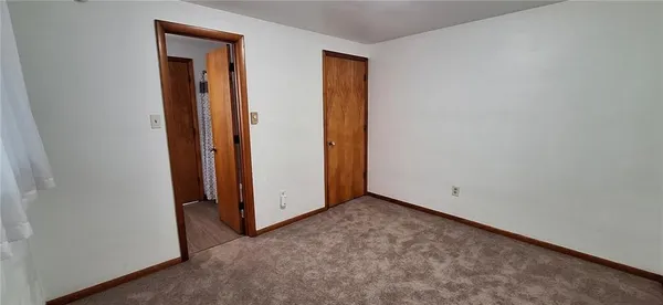 an empty room with closet