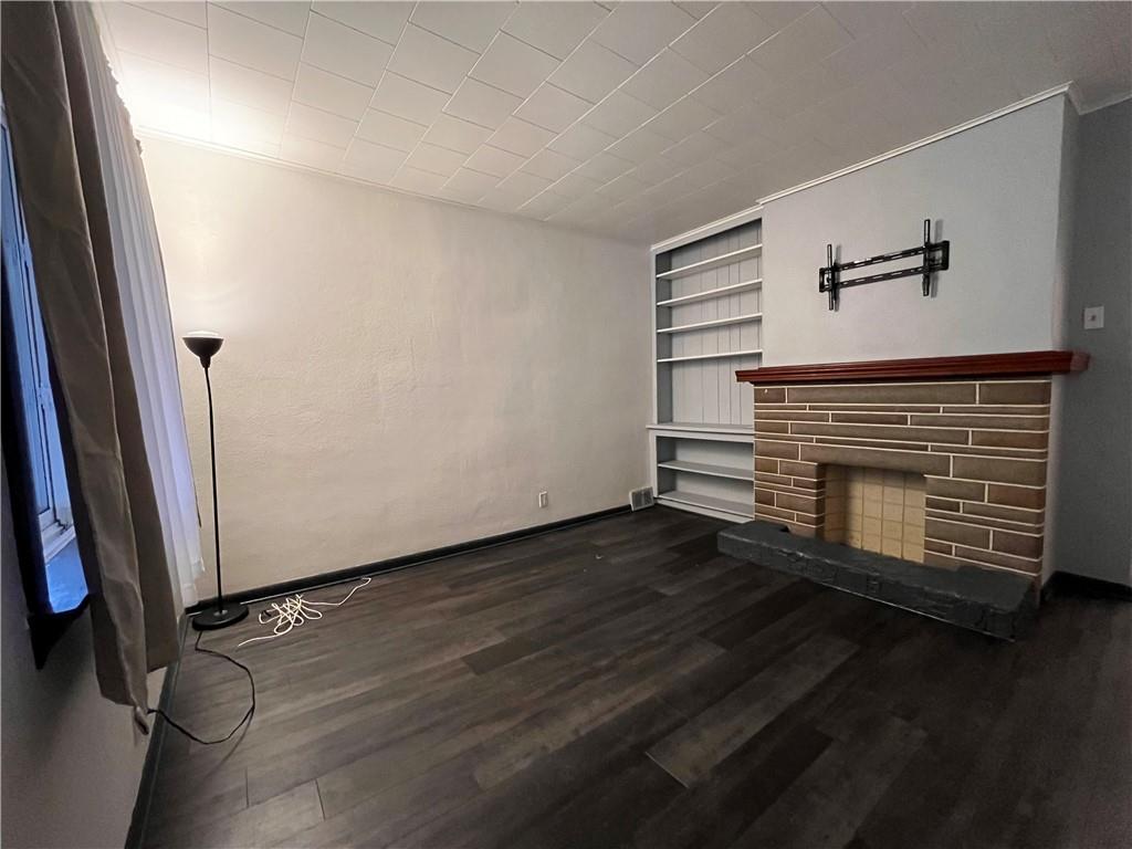 5124 Carnegie Street Pittsburgh, PA 15201 - Photo 3 of 44 an empty room with wooden floor and windows