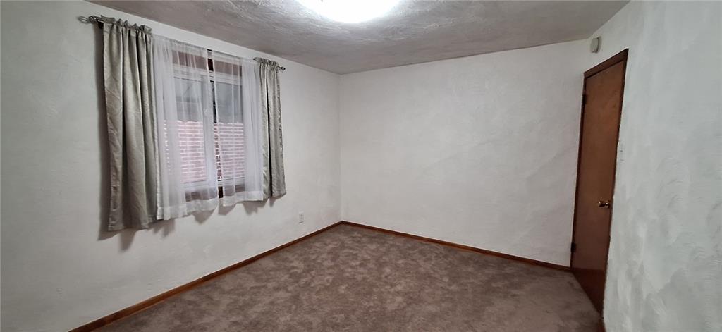 5124 Carnegie Street Pittsburgh, PA 15201 - Photo 38 of 44 an empty room with windows