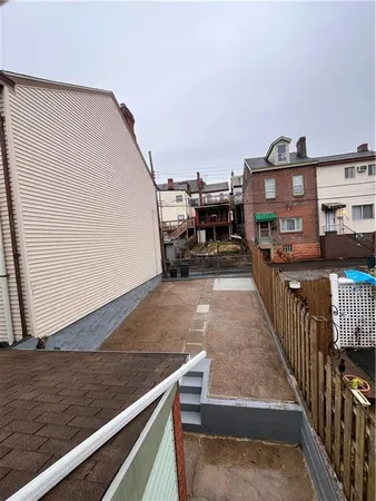 a view of a balcony with stairs