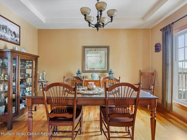 a living room with furniture or couch and a wooden floor