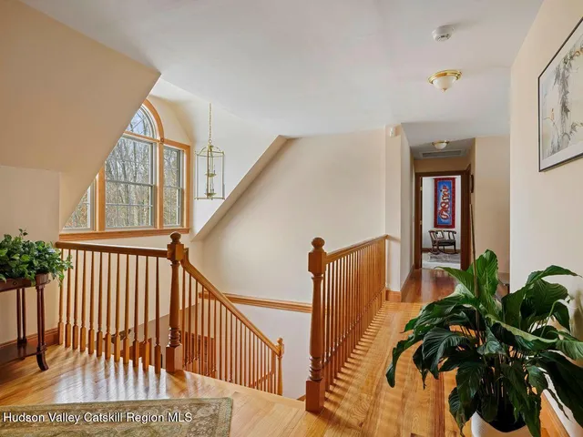 a bed room with a bed and a chair