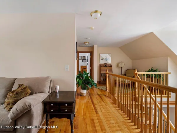 a bathroom with a sink a toilet and a shower curtain