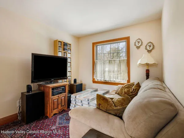 a bed room with a bed and a dresser