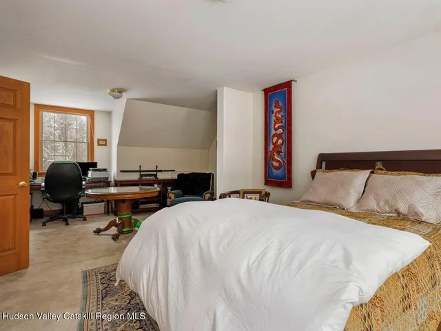 a house with trees in the background