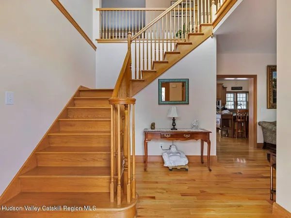 a kitchen that has a table and chairs in it