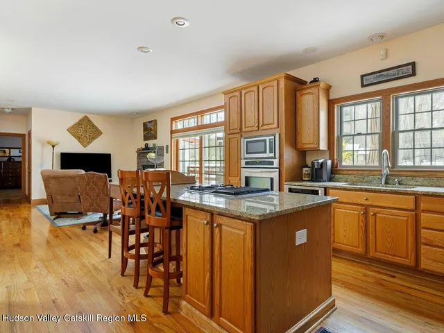 a kitchen with a stove and a table