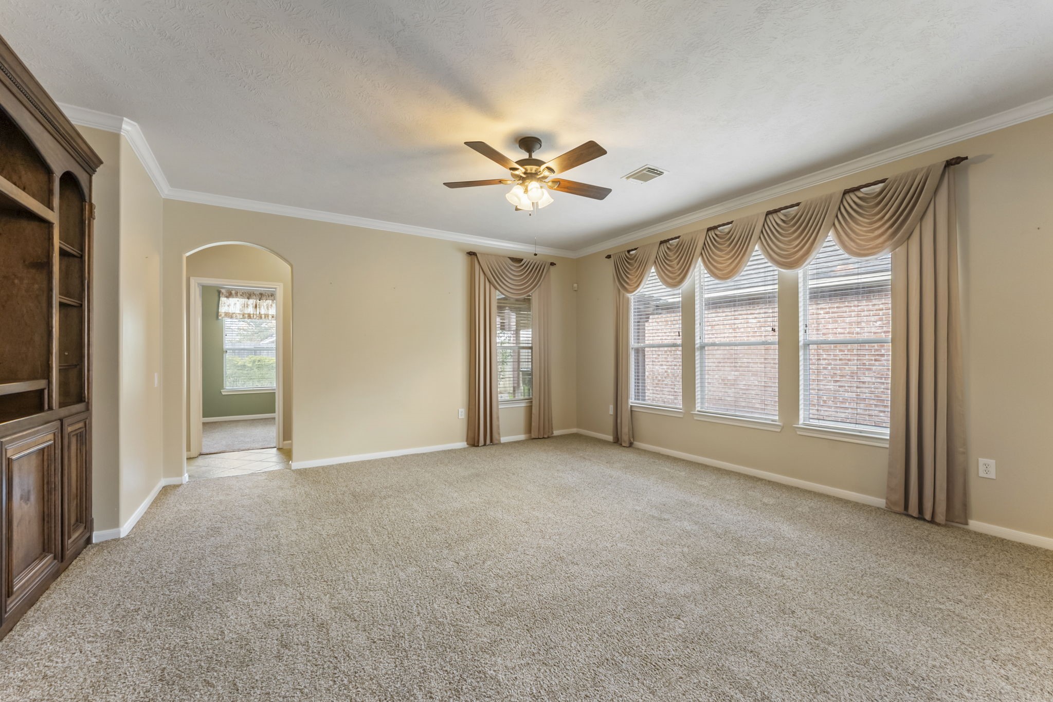 11 South Bendrook Loop Conroe, TX 77384 - Photo 11 of 27 a view of an empty room with a window