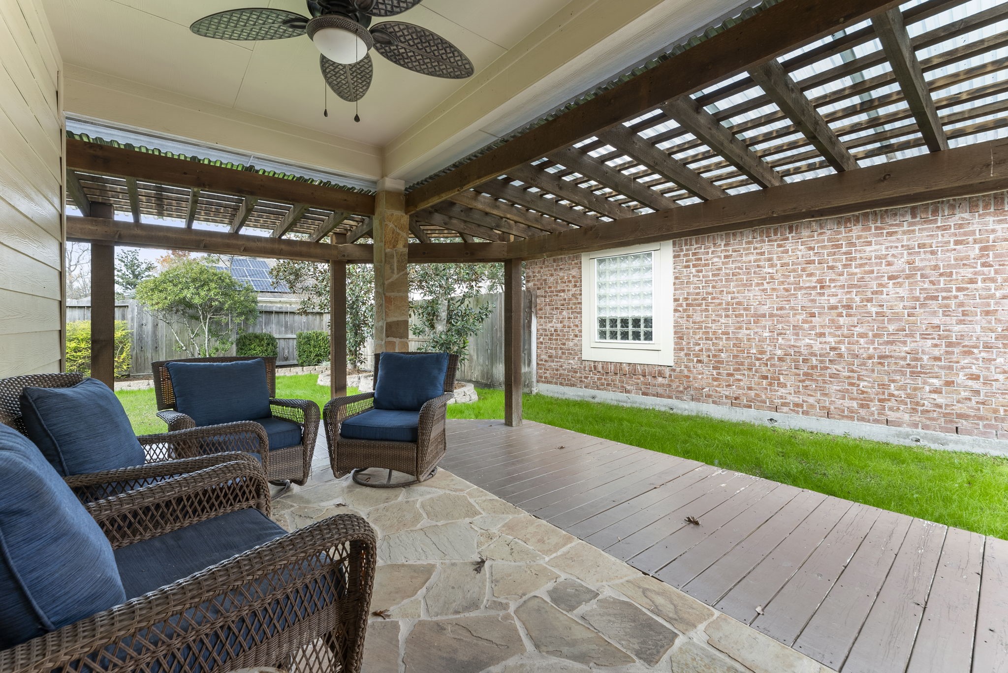 11 South Bendrook Loop Conroe, TX 77384 - Photo 20 of 27 a building outdoor space with patio furniture