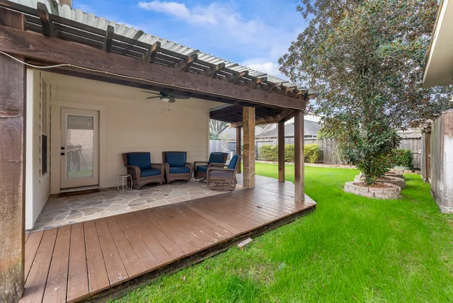 a outdoor space with patio the couch and wooden floor