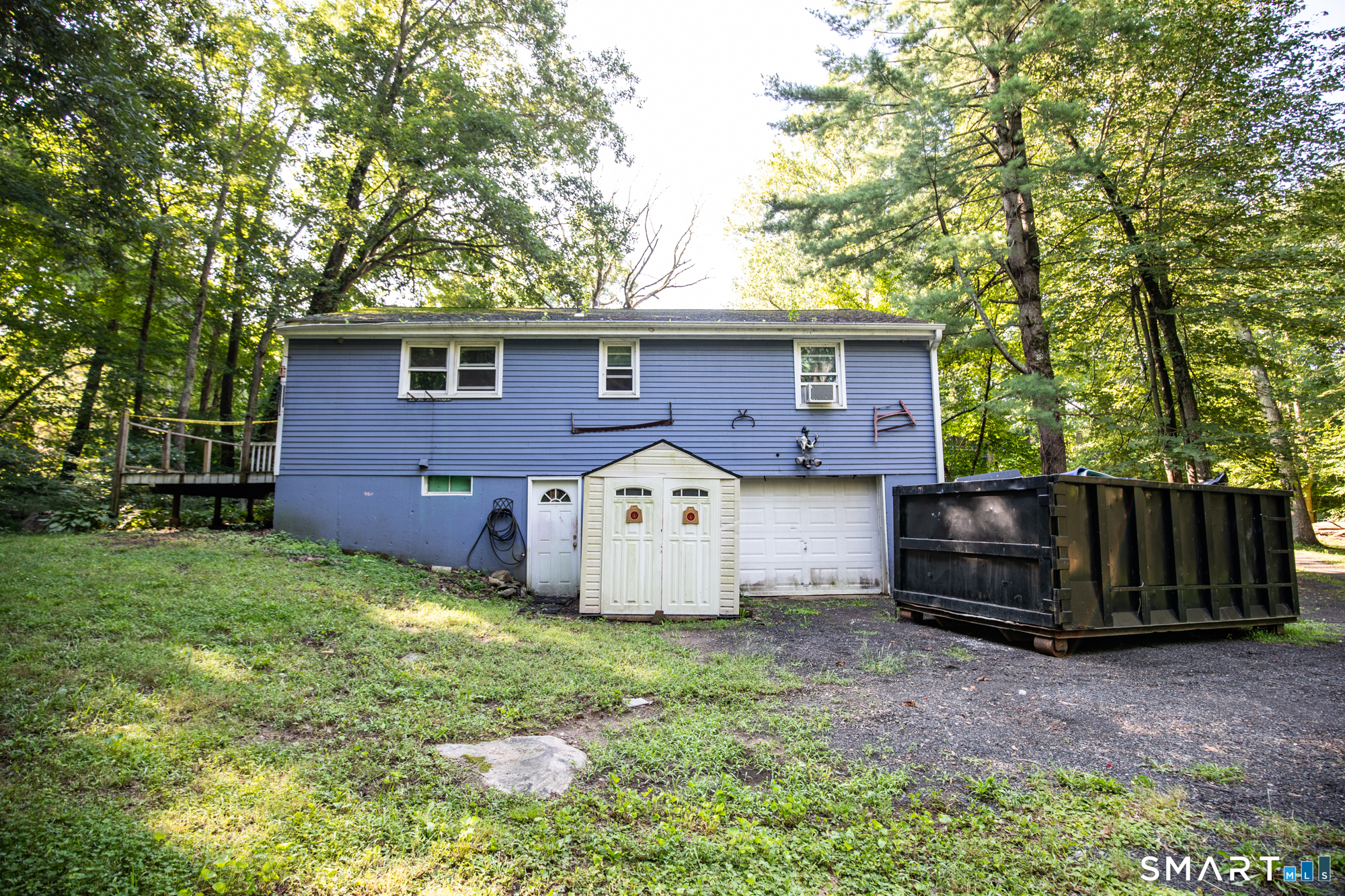 38 Little City Road Killingworth, CT 06419 - Photo 17 of 20 Rear exterior and basement garage door